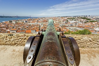 Medieval cannon, view from the Castelo de São Jorge castle to the historic centre of Lisbon,