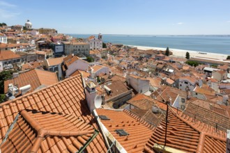 View over the red roofs of Lisbon to the Cathedral SÃ©, Lisbon, Lisbon District, Portugal, Europe,