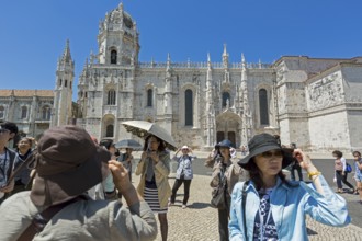 Japanese tourists in front of the Mosteiro dos Jerónimos, UNESCO World Heritage Site, Lisbon,