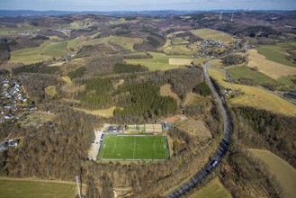 Aerial view, football stadium TuS Rhode e.V. and tennis courts TC Rhode, hilly landscape with