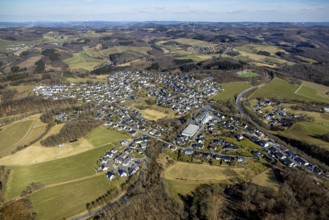 Aerial view, view of Rohde residential area, wooded area, hilly landscape, church of the parish of