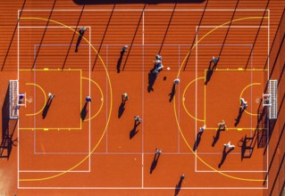 Aerial view, red football pitch at the Georg-Müller-Schule comprehensive school with pupils, shapes