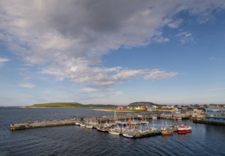 Harbour with fishing boats and view of Vardø, Finnmark, Norway, Scandinavia, Europe, adventure