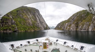 Cruise in a fjord, ship bow, Digermulen, Nordland, Norway, Scandinavia, Europe, adventure trip,