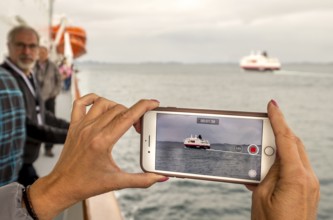 Ship MS Kong Harald, mobile phone photography, ship filming, Bolga, Nordland, Norway, Scandinavia,