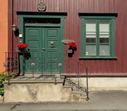 Shapes and colours, picturesque doors and windows, Nedre Bakklandet, Nygata Street, Trondheim,