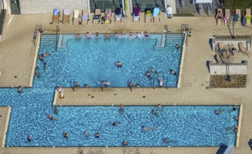 Aerial view, saltwater pool, outdoor swimming pool and bathers, sun loungers, Werne, Ruhr area,