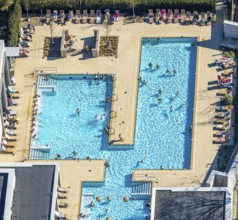 Aerial view, saltwater pool, outdoor swimming pool and bathers, sun loungers, Werne, Ruhr area,