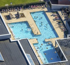 Aerial view, saltwater pool, outdoor swimming pool and bathers, sun loungers, Werne, Ruhr area,