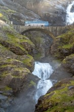 Coach, bridge Stigfossbrua, waterfall Stigfossen, Innfjorden, Møre og Romsdal, Norway, Scandinavia,