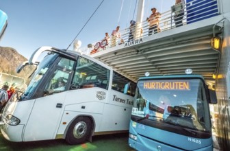 Coaches on a ferry, Eidsdal, Møre og Romsdal, Norway, Scandinavia, Europe, adventure travel,