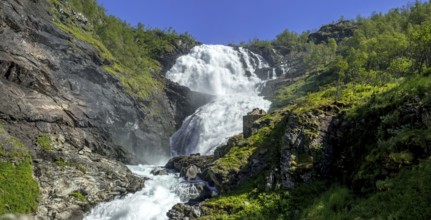 Kjosfossen waterfall, waterfall near Fureberget, rock faces, trees, sky, Flåm, Sogn og Fjordane,
