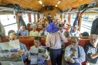 Travel by Flam Railway, iron railway journey, tourists in Flåmsbana, Flåm, Sogn og Fjordane,