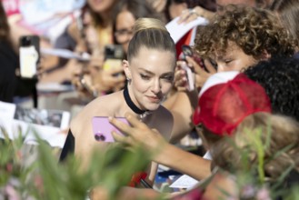 Venice, Italy - 1 September 2025: Amanda Seyfried signing autographs during the Red Carpet of - The
