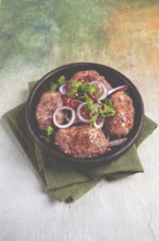 Fried apkhazura, cutlet in a fat grid, spicy, Georgian dish, fried on ketsi, homemade, no people