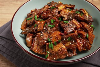 Bulgogi, with mushrooms, with sesame seeds and green onions, Korean cuisine, homemade, no people