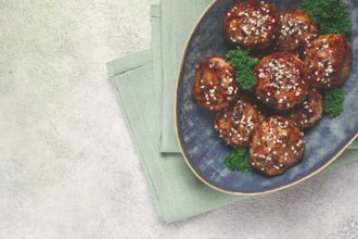 Tsukune, Japanese meatballs, minced chicken, fried on a skewer, with yakitori sauce, homemade, no