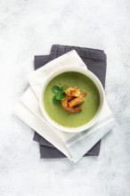 Pea cream soup, with shrimp, green soup, homemade, top view, no people
