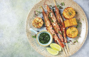 Langoustines on skewers, shrimp kebab, with fried corn, spices and herbs, homemade, no people