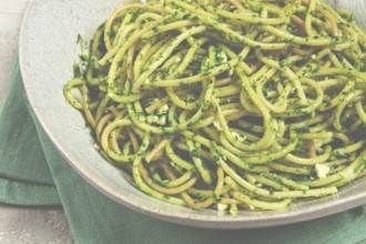 Spaghetti with pesto sauce, homemade, no people