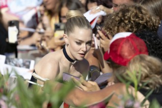 Venice, Italy - 1 September 2025: Amanda Seyfried signing autographs during the Red Carpet of - The