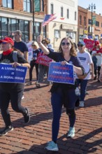Detroit, Michigan USA - 1 September 2025 - Members of Indivisible march in Detroit's Labor Day