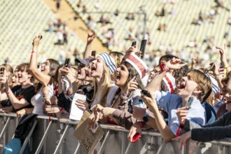 Festival visitors celebrate with Conan Gray at the Superbloom Festival, day 2 in the Olympiapark,