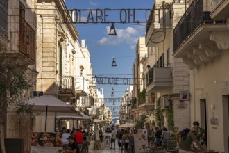 The lyrics of the song VOLARE Nel blu dipinto di blu as illumination over the pedestrian zone Via