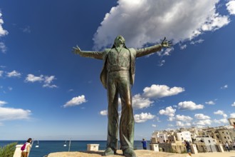Statue of the singer Domenico Modugno, Polignano a Mare, Apulia, Italy