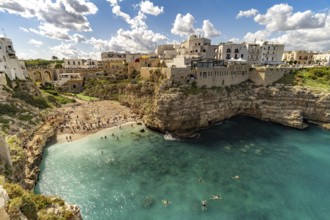 City beach Spiaggia Llama Monachile in Polignano a Mare, Apulia, Italy