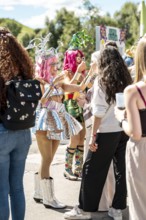 Festival visitors are made up with glitter at the Superbloom Festival, Day 2 in the Olympic Park,