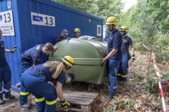 Emergency services from the infrastructure specialist group set up water, sewage, electricity and