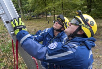 Emergency services from the infrastructure specialist group set up water, sewage, electricity and
