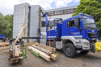Preparation work for the construction of a facade support, a building in danger of collapsing, with