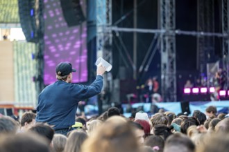 Visitors celebrate during Nelly Furtado's performance at the Superbloom Festival, Day 1 at the