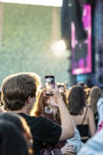 Visitor films the performance of Nelly Furtado at the Superbloom Festival, Day 1 at the