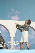 Ralph Stachulla (Keyboarder) of Roy Bianco & Die Abbrunzati Boys with champagne bottle at the