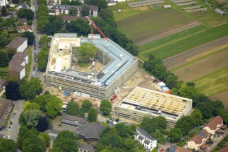 Aerial view, construction site with new building of the Anne-Frank comprehensive school on Obere