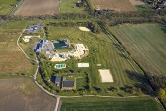 Aerial view, natural swimming pool Olfen outdoor pool and sandy beach and water playground,
