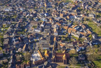 Aerial view, city centre view with town hall and new building site with facade cladding, market