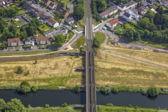 Aerial view, Ruhr river and Ruhr valley with railway bridge, construction site Am Ruhrufer and