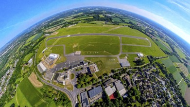 Aerial view, Essen-Mülheim airfield with runway and landing strip, airship and airship hangar,