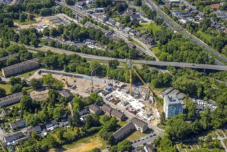 Aerial view, construction site with new building mammoth project for the development of the