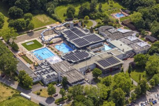 Aerial view, LAGO Die Therme, swimming pool and wellness centre with water slide, roof with solar