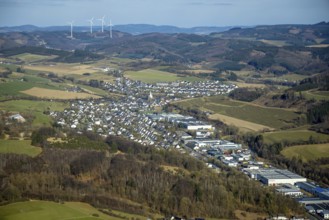 Aerial view, Elspe commercial area with residential area and village view with catholic church St.