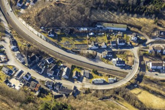 Aerial view, town view and curved Antoniusstraße with bridge over the federal road B517 in Hofolpe,
