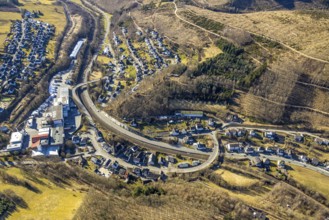 Aerial view, town view and curved Antoniusstraße with bridge over the federal road B517 in Hofolpe,