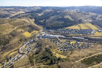 Aerial view, town view and curved Antoniusstraße with bridge over the federal road B517 in Hofolpe,