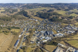 Aerial view, residential area local view and forest area hilly landscape with forest damage,