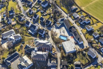 Aerial view, community primary school, below construction site with new building for new senior